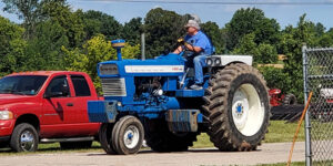 Man driving a tractor.